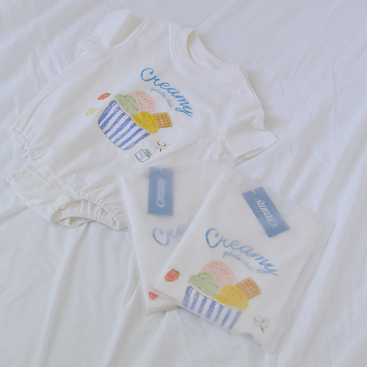 Creamy Gelato Romper flat lay with hang tags