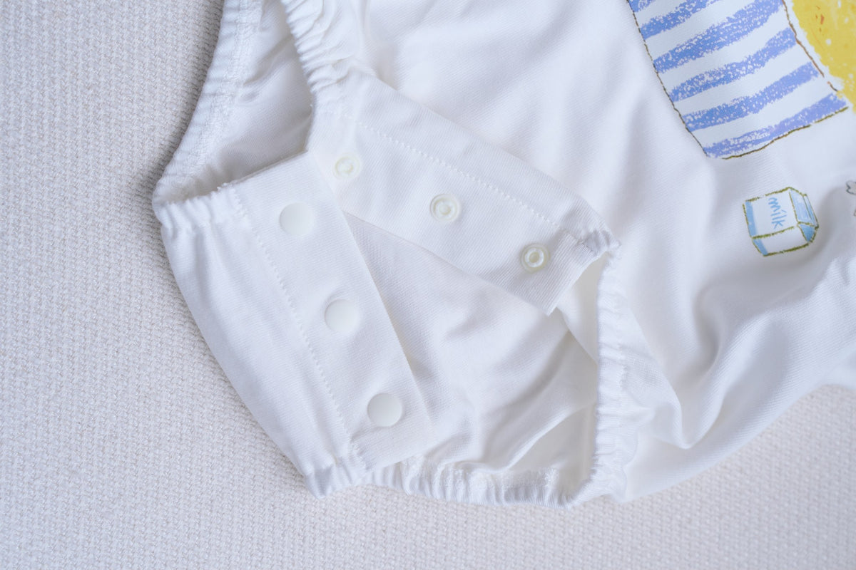 Crotch snaps and bloomer hem on Creamy Gelato Romper